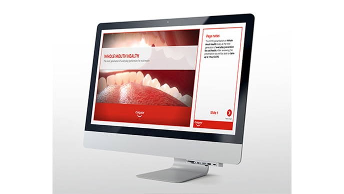 Colgate Whole Mouth Health interactive presentation on a desktop monitor, showcasing the next generation of everyday prevention for oral health
